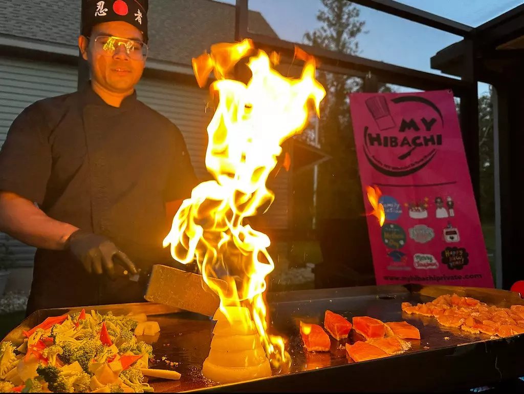 Hibachi private chef with fun tricks and flame